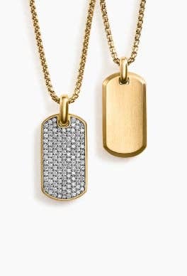 Two David Yurman yellow gold dog tags.