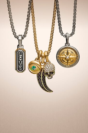 Three David Yurman cuff bracelets for men.