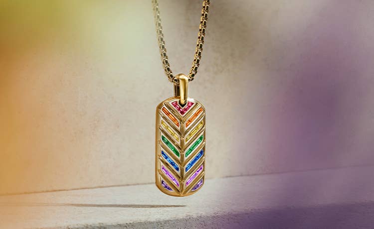 Shop pavé rainbow tag in 18k yellow gold.