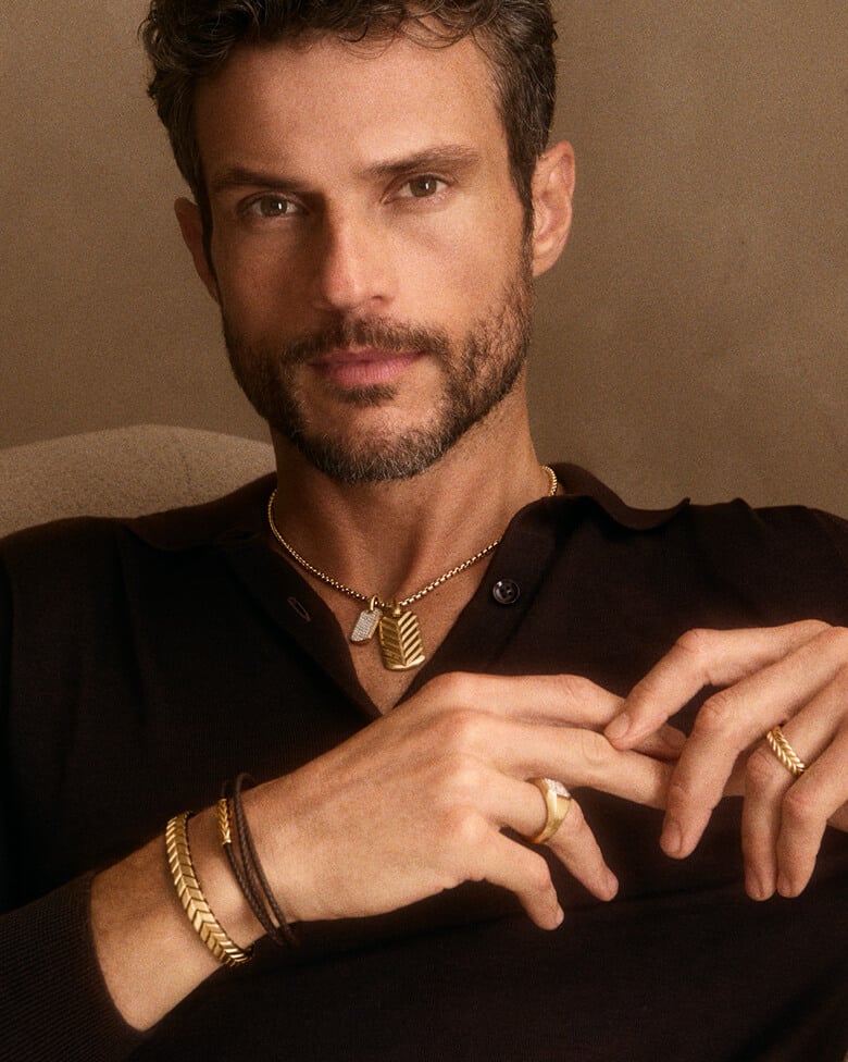 Male model wearing David Yurman Chevron jewelry.