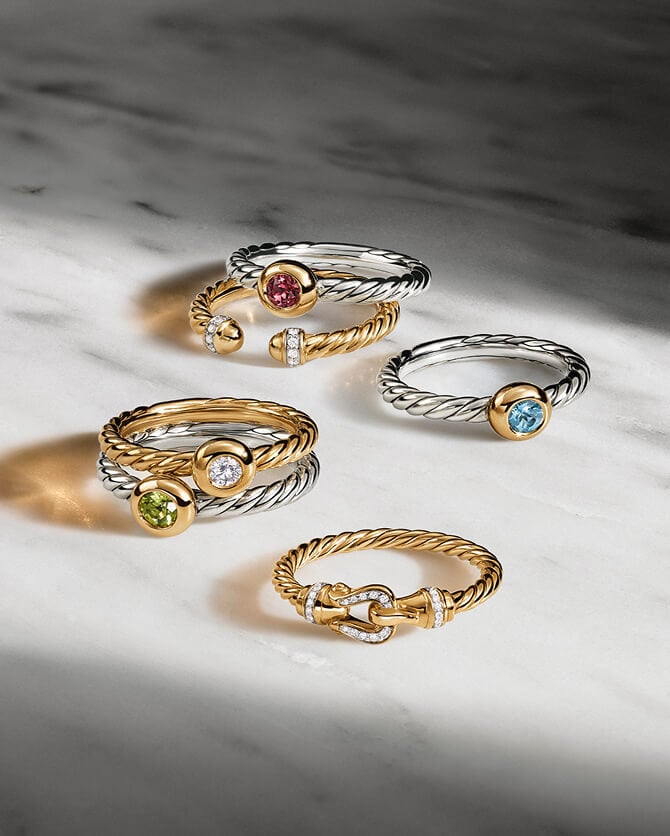 Six David Yurman rings in various metals.
