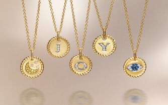 Amulets spelling JOY