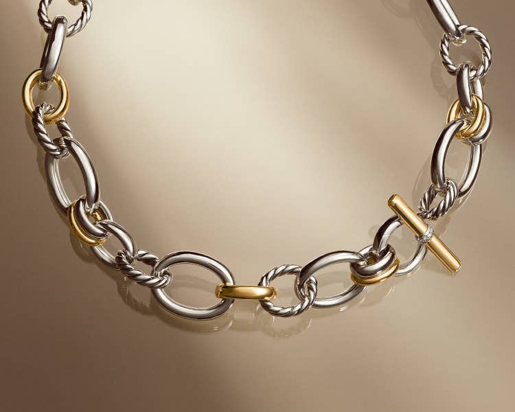 An image of a DY Mercer chain link necklace in silver and gold.