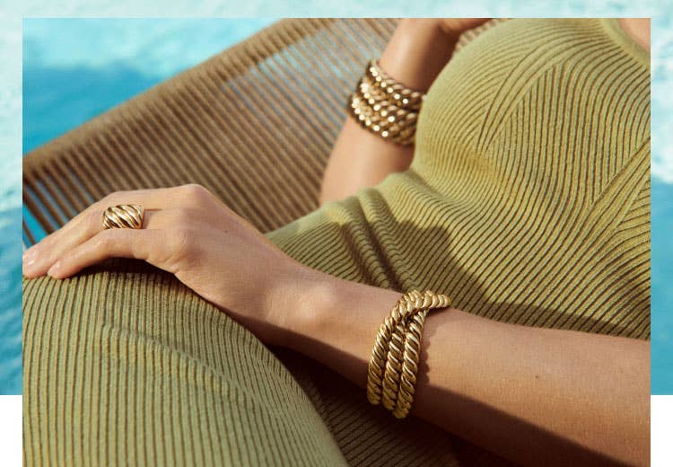 David Yurman spring campaign featuring Scarlett Johansson wearing gold Sculpted Cable bracelets and ring.