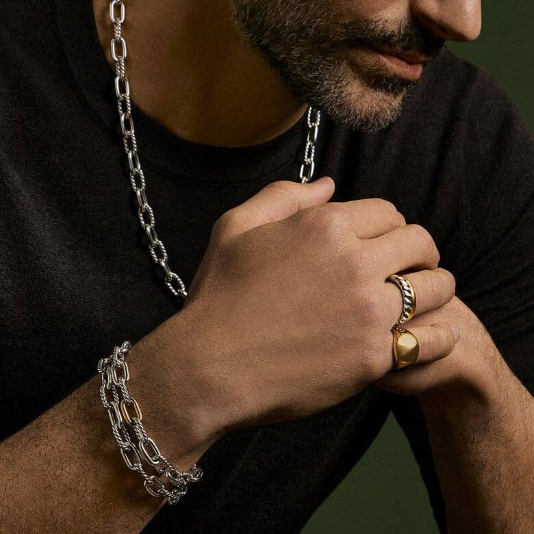 A male model wearing David Yurman Madison jewelry.