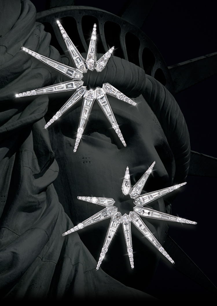An image of liberty earrings in white gold with diamonds.