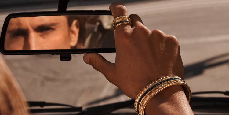 An image of James Turlington wearing David Yurman Pyramid.