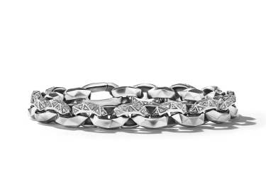 Shop torqued faceted bracelet with pavé diamonds.
