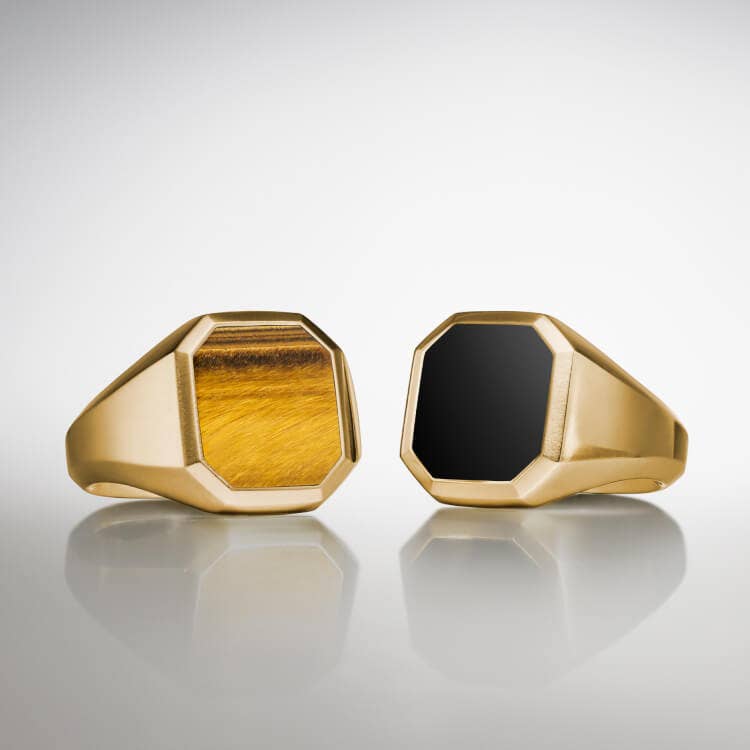 Two David Yurman Streamline rings for men.