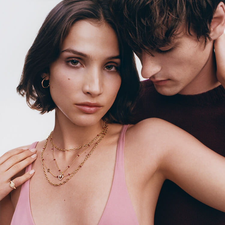 An image of a man and woman wearing David Yurman jewellery.