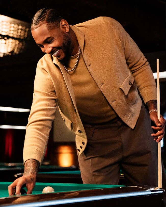Carmelo Anthony playing pool.