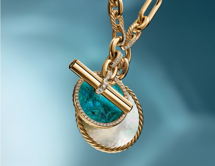 Yellow Gold Lexington necklace with two DY Elements amulets.