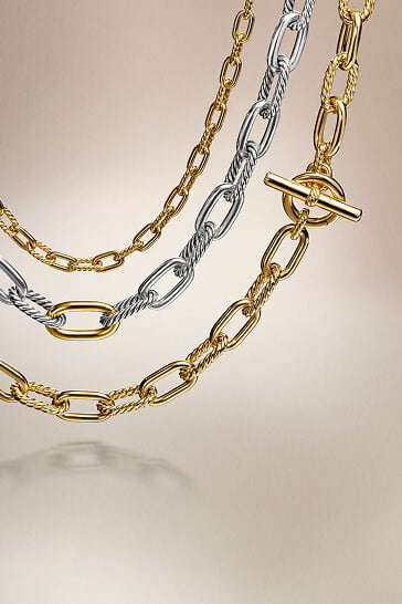 Three David Yurman women's chain necklaces.