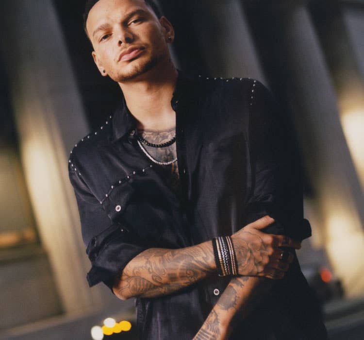 An image of Kane Brown wearing chain bracelets and necklace.