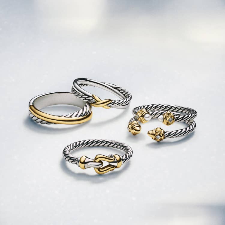 An image of five David Yurman rings.