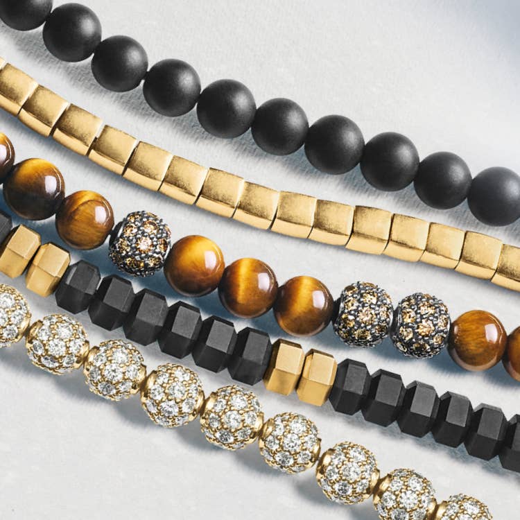 An image of five David Yurman Spiritual Bead necklaces.
