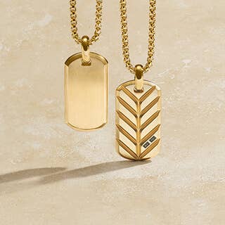 Two Yellow Gold David Yurman tags on yellow gold chains.