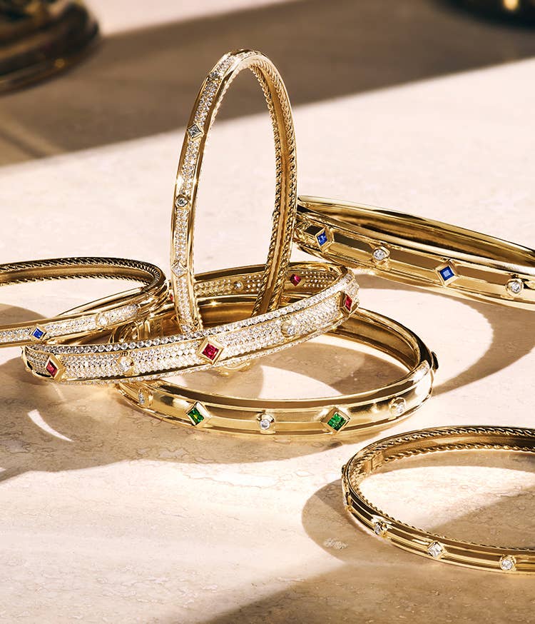 An image of 5 modern renaissance bracelets in yellow gold with precious gemstones and diamonds.