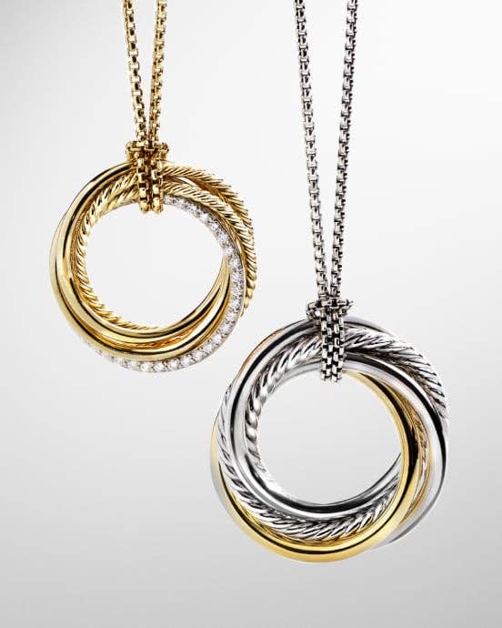 A Crossover bangle in gold with diamonds.