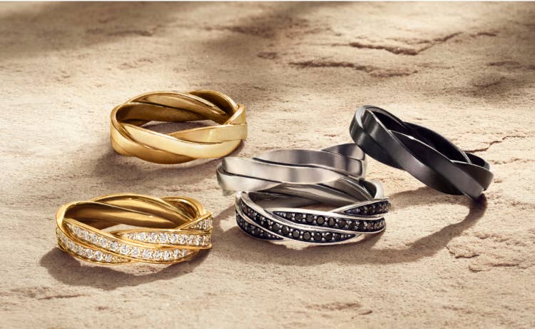 An image of five DY Helios band rings.