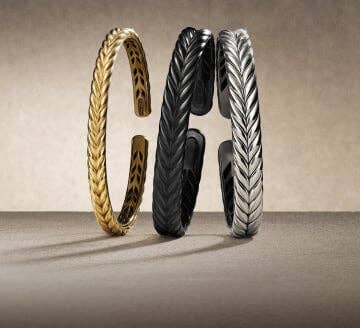 Three David Yurman Chevron bracelets.