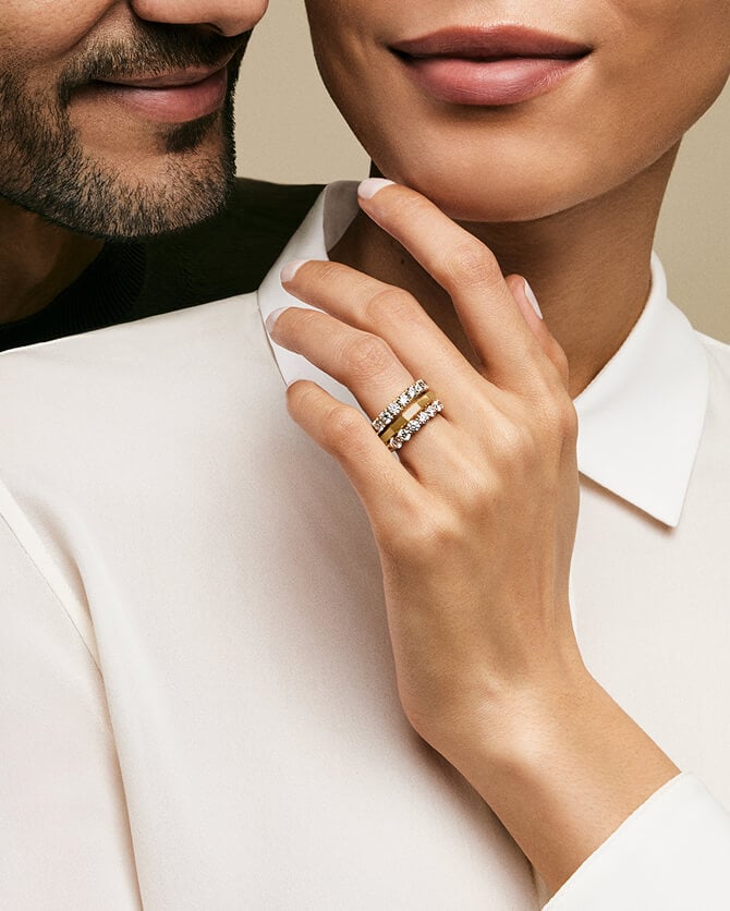 A woman wearing David Yurman rings.