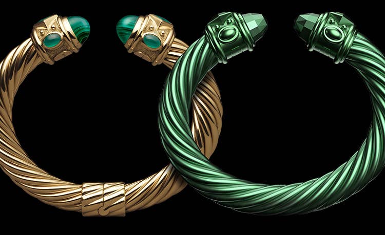 An image of a David Yurman Renaissance bracelet in 18K yellow gold on the left overlapping with a green-hued aluminum version of the same bracelet on the right. The bracelet on the left features emerald cabochons.