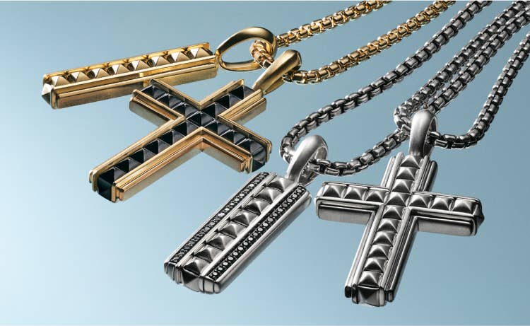 An image of Four Pyramid pendants in silver and yellow gold.