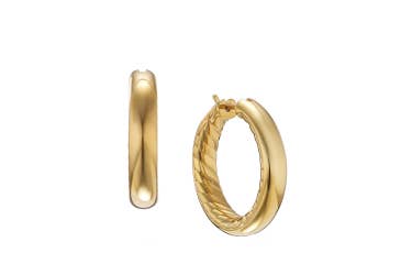 Shop Sculpted Cable hoop earrings in yellow gold.