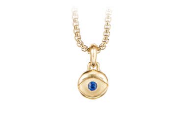 Shop Evil Eye amulet in yellow gold with blue sapphire.