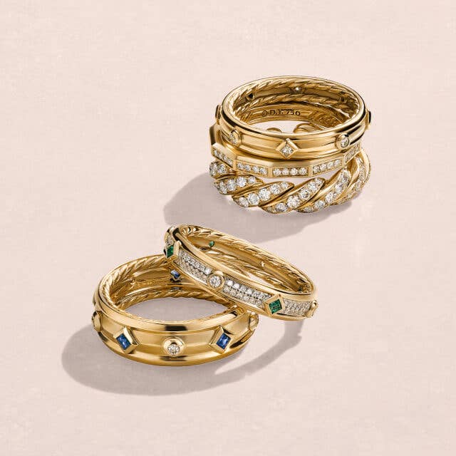 Four David Yurman band rings with and without stones.