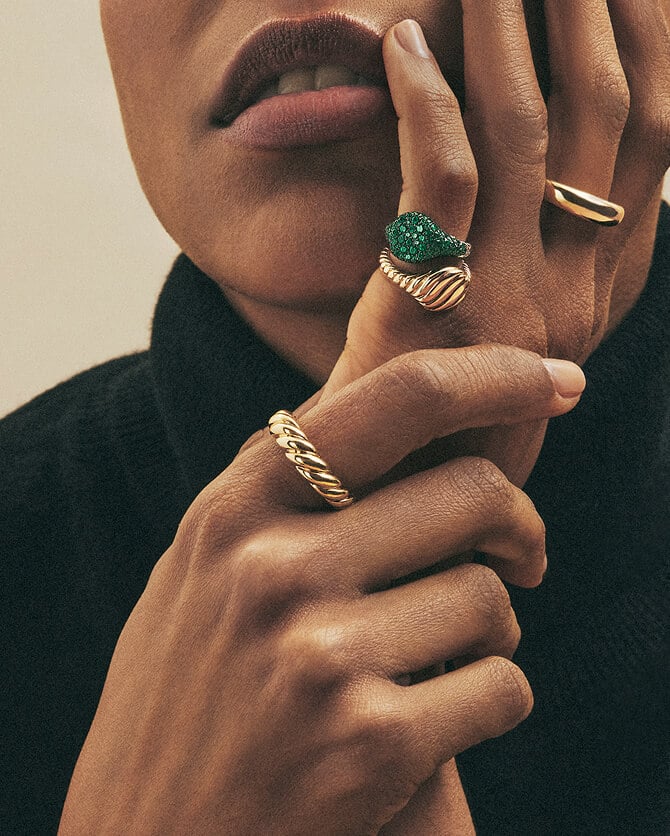 A woman wearing David Yurman rings.