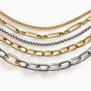 Five David Yurman chain necklaces in a variety of designs.