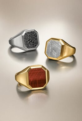 Three David Yurman signet rings.