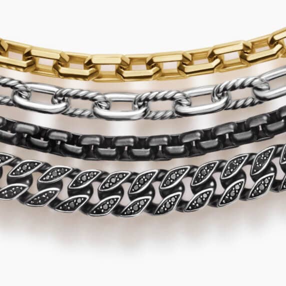 Four David Yurman chain necklaces for men.