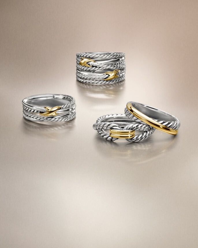 Four David Yurman Crossover rings for women.