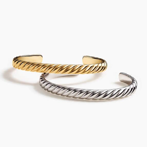 Two David Yurman cable cuff bracelets for men.