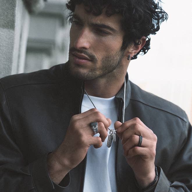 Model wearing David Yurman jewelry.