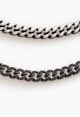 Four David Yurman curb chain necklaces.