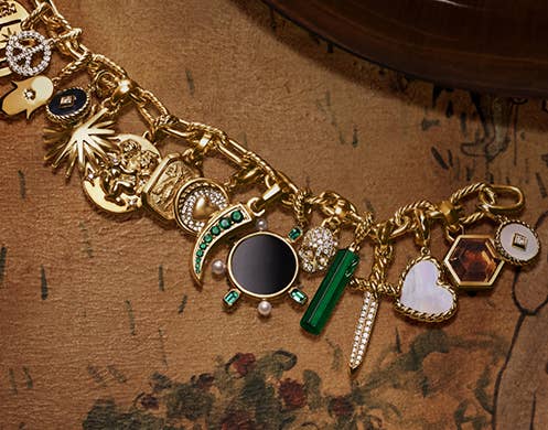 Shop charms & amulets for her.