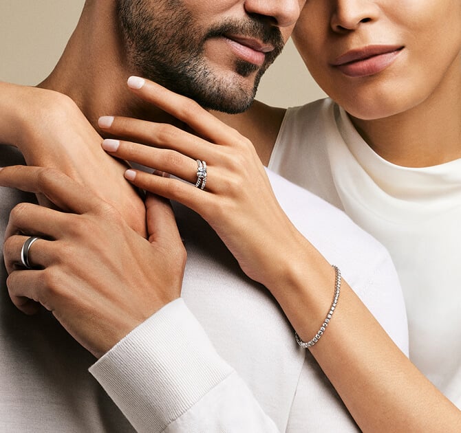 A man and woman wearing David Yurman jewelry.