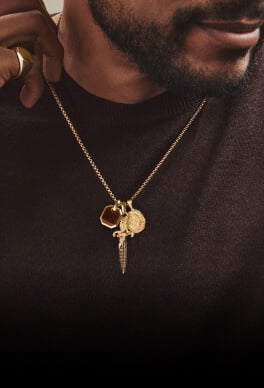 David Yurman amulets on a model.