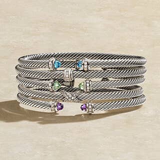 Two David Yurman Sculpted Cable Cuff Bracelets in Sterling Silver.