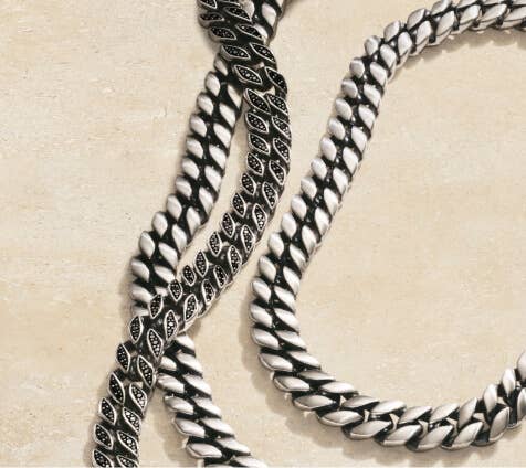 A collection of 3 David Yurman curb chain necklaces.