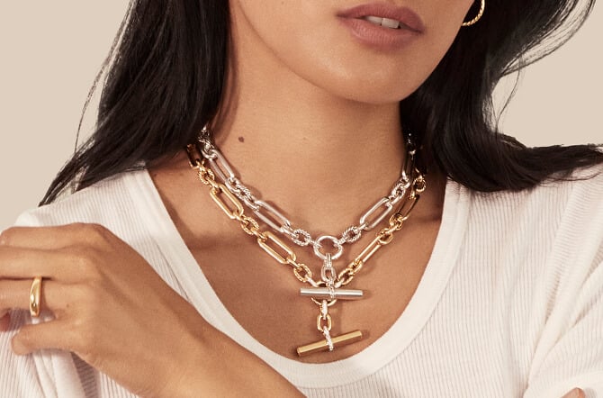 Model wearing two David Yurman necklaces.