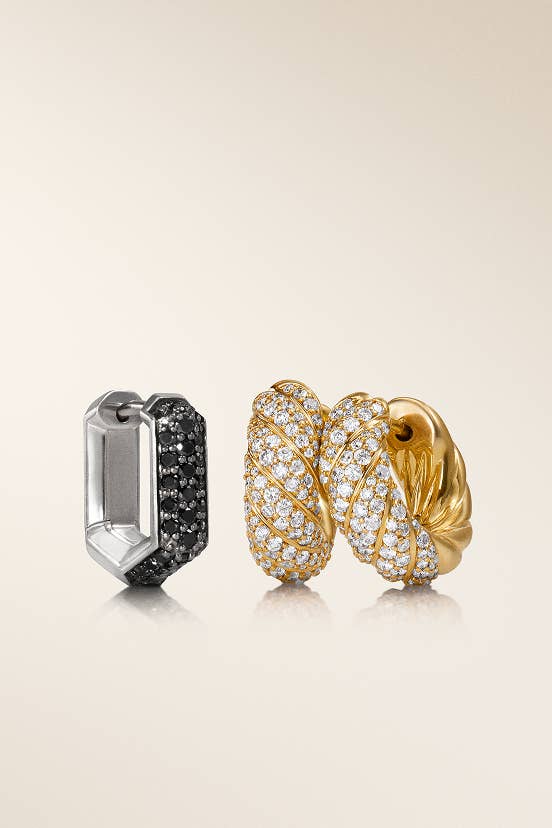 One men's and a pair of women's David Yurman earrings.
