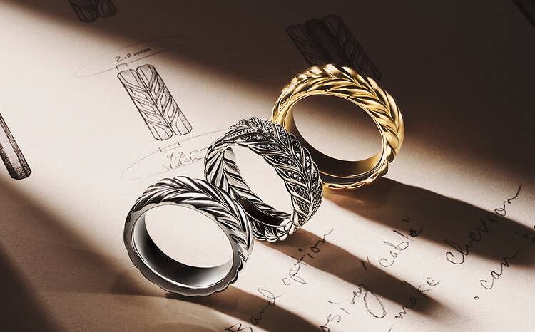 Three David Yurman Chevron rings.