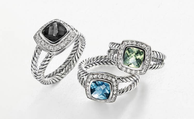 An image of three David Yurman petite Albion rings.