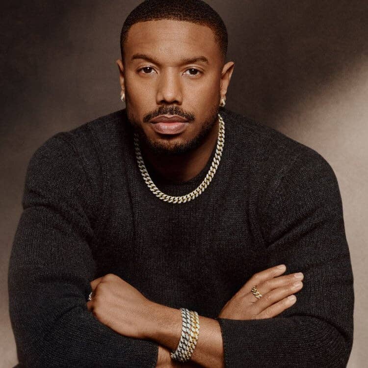 Michael B. Jordan posing in David Yurman Curb Chain jewelry.