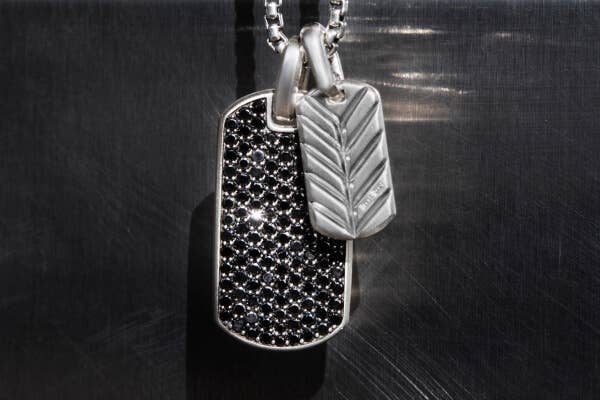 Two David Yurman Men's Chevron Collection tags in silver and pave diamonds.
